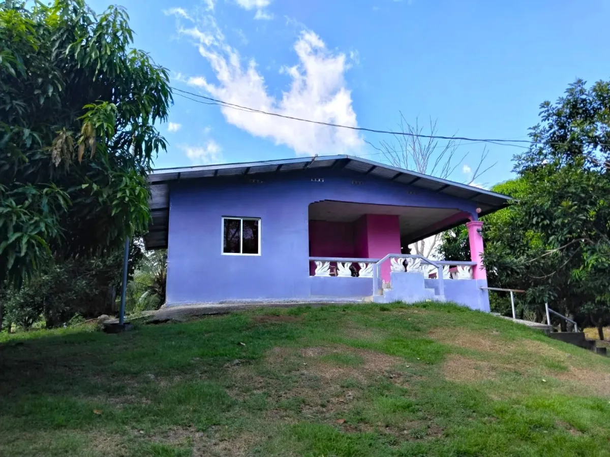 Large plot of land with a small house in Boquerón